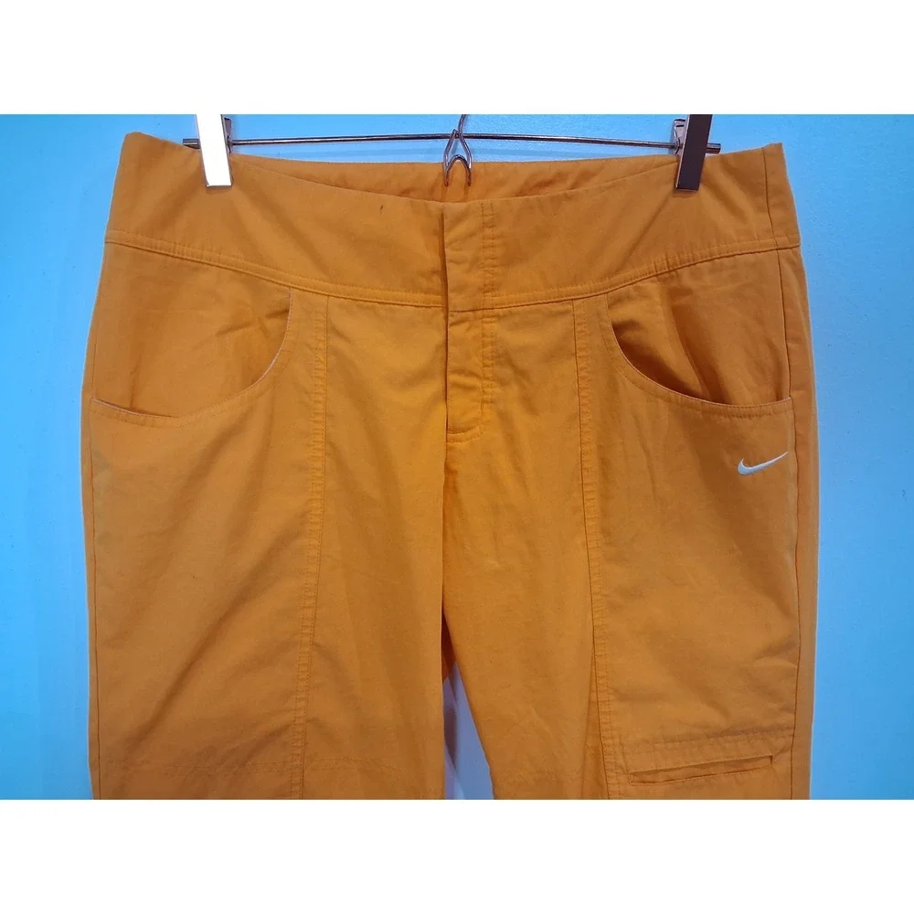 Nike Womens Orange Cargo Capri Pants Size L Cropped Hiking Utility Toggles